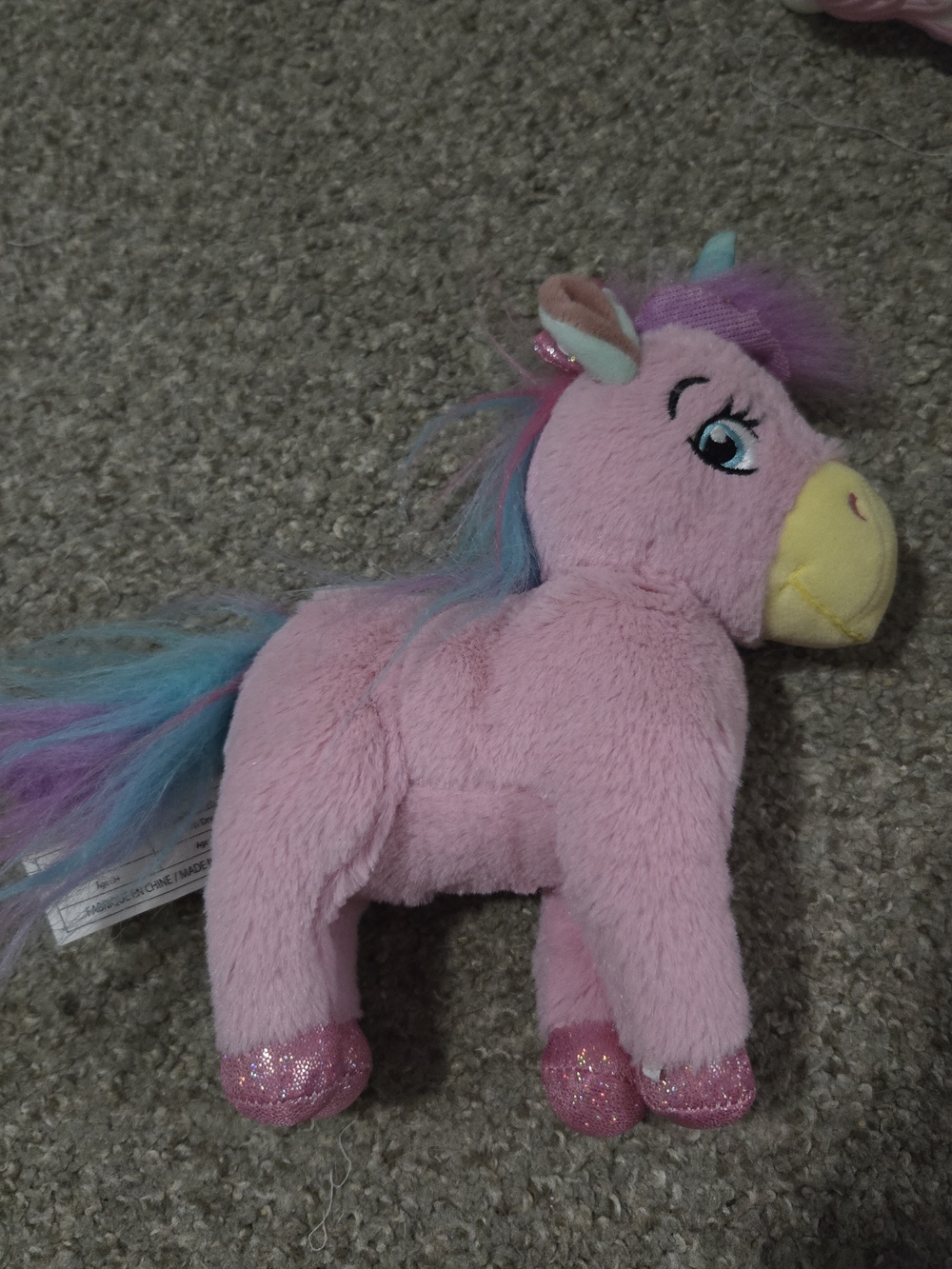 Plush Pink Unicorn Stuffed Toy with Colorful Mane